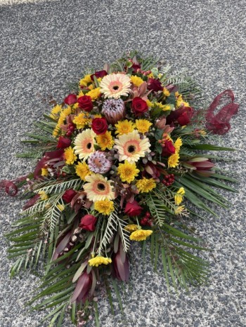 Casket flowers in brights